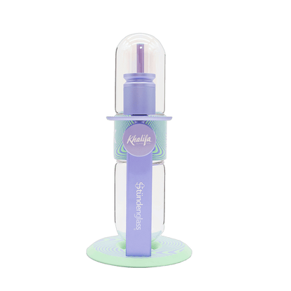 Khalifa Stündenglass gravity infuser in motion mid-rotation